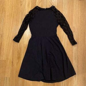 Black express dress with sheer sleeves